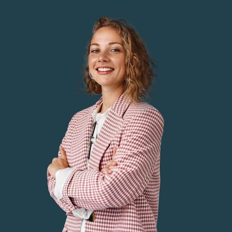 female event organizer crossing arms in a confident way