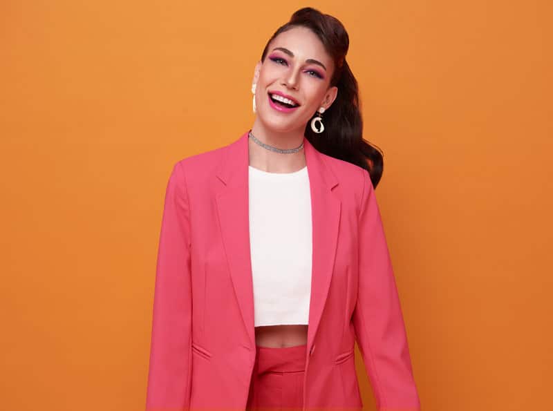 Female event organizer feeling happy about Timely.Fun event discovery platform